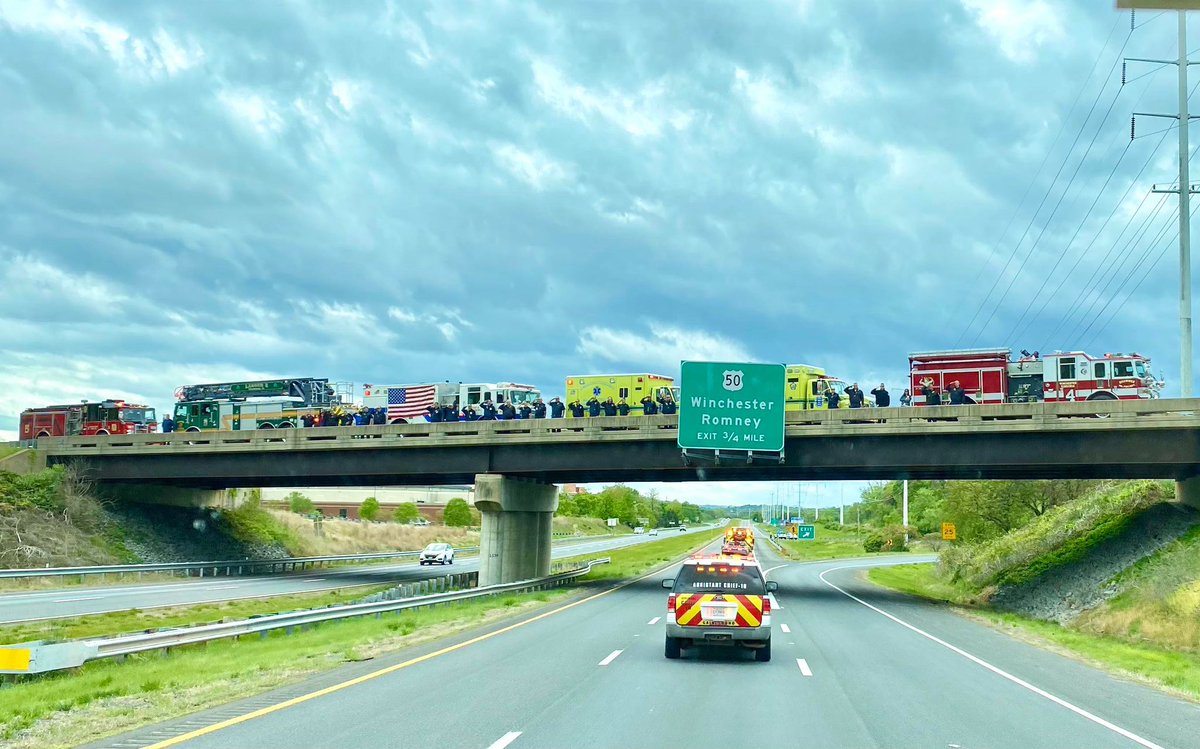 WFRDva's tweet photo. WFRD personnel pay their respects as the funeral procession for Deputy Chief Chester Lauck passes by. Rest easy Chief. #WFRD #CityOfWinchester #RIP https://t.co/qMBHuht6p9