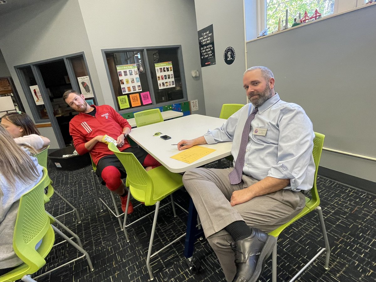 AVIDJeffMS's tweet photo. Dr. Caine &amp; Coach Barnes sweating their answers! Quote from Dr. C: “Who wrote these questions? They’re hard!” (Answer: #AVID8!) @jmscyclones #AVID #AVIDfamilyTRIVIA https://t.co/ECsSziGx9H