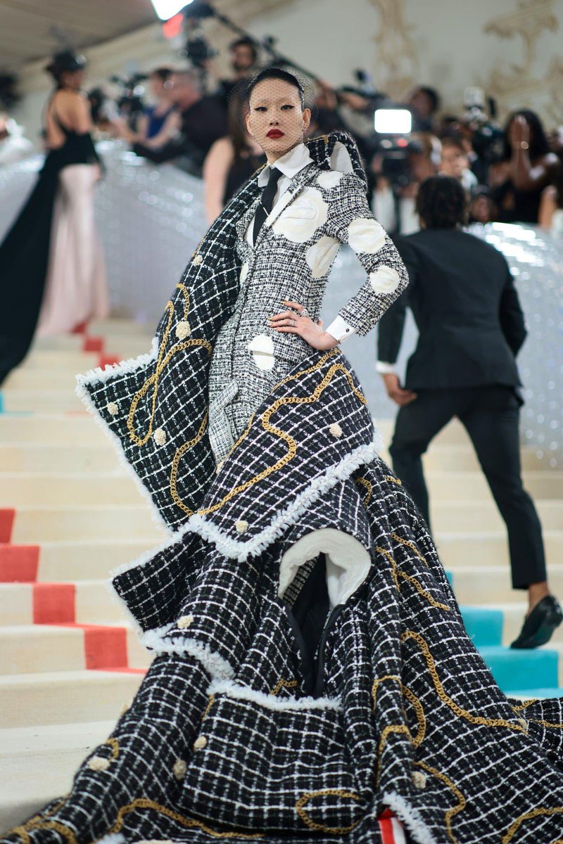 sora choi at the #metgala in thom browne