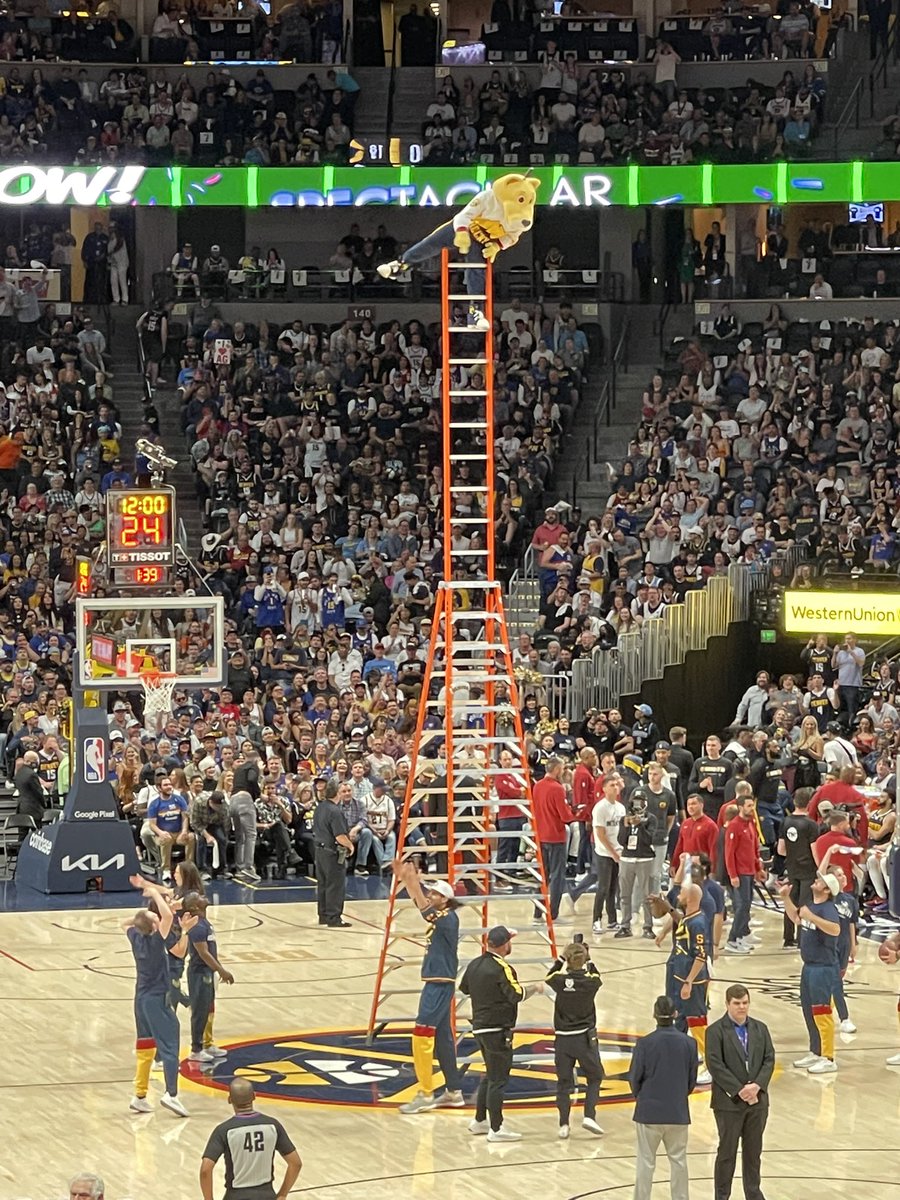 Rocky just hit the half court backwards three from up here. Nuggs in 4.