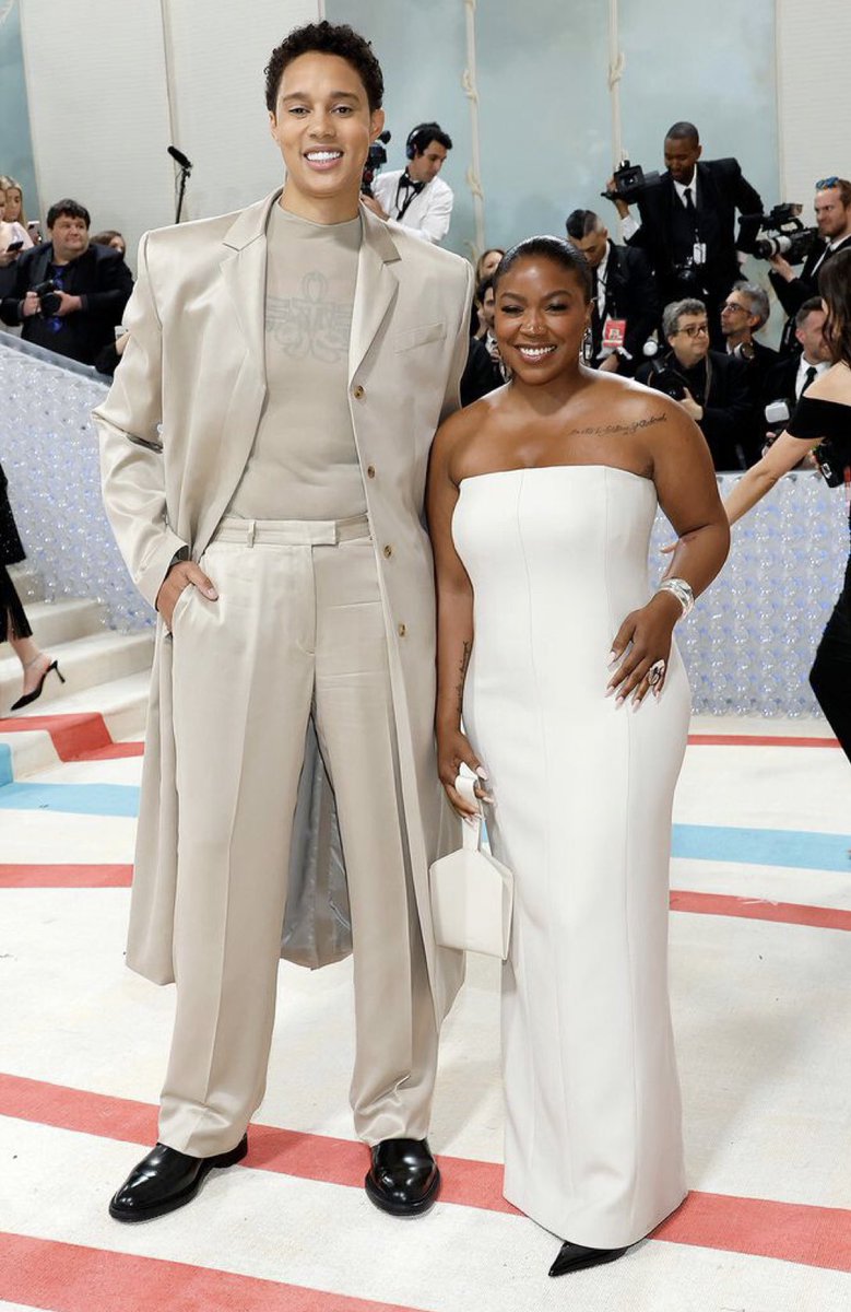 dapperQ's tweet image. Brittney and Cherelle Griner made their Met Gala debut wearing custom @calvinklein 01May2023.

Brittney, 32, and Cherelle, 30, walked the red carpet in NYC side-by-side, just months after the WNBA star returned home from Russian imprisonment.
PHOTO: MIKE COPPOLA/GETTY

#dapperq