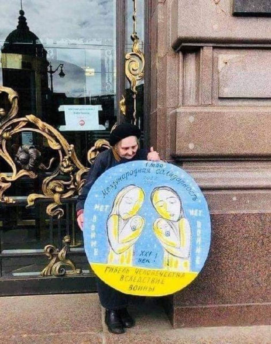 1st May, St. Petersburg 
Yelena Osipova, an an opposition activist known as "conscience of St.Peterburg", held an anti-war picket in the very centre of the city. 
The sign reads, " 1st May — international solidarity // no to war// 21st century// the demise of humanity due to war"