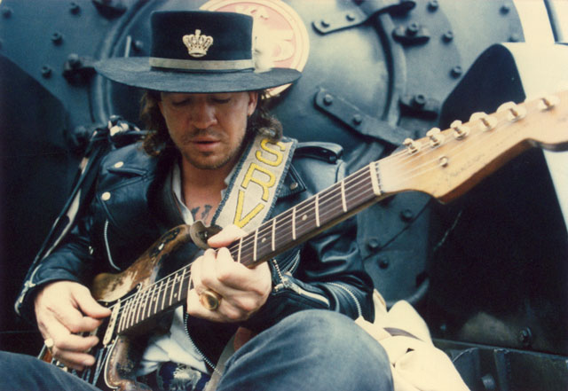 crockpics's tweet photo. Stevie Ray Vaughan sitting on the front of an old locomotive during a visit to New Zealand in February 1988. Photo by Janna LeBlanc https://t.co/FKyM6I87UM