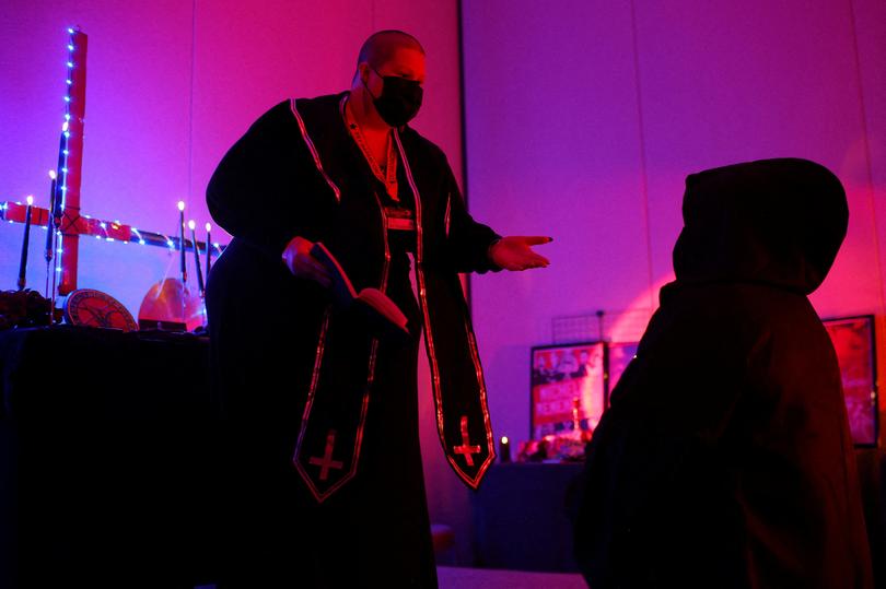 HoldtheLineNow's tweet photo. Pictures from SATANCON, the Satanic Temple Conference, which shredded Bibles, Pro-Police flags and performed UN-Baptisms.  But, reminder, they are not a spiritual group!! https://t.co/rZQKOzuCRK https://t.co/TkinlyXQna