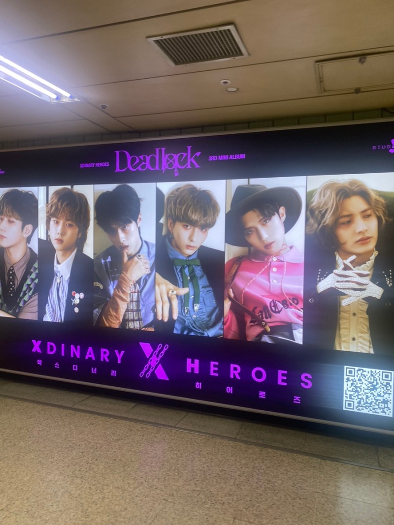 there's a new subway ad for xdinary heroes' deadlock promos located at samsung station! 🥹 the promos for this comeback are improving omg