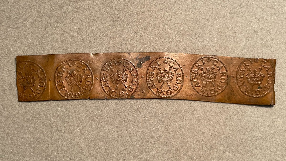 The English token farthings of James VI/I &amp; Charles I were made with a cylinder press. Strips were passed between rollers to impress the design. This strip shows how they looked prior to being cut out. We'll handle it in the <a href="/NEMN2023/">NEMN Conference 2023</a> workshop x.com/NEMN2023/statu… #Numismatics