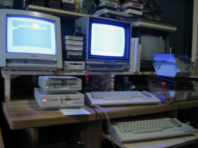 PS4Ron's tweet photo. Been looking through some old hard disks today, and i found some old photos of my old computer room/game room. I think the photos are from around 2008 🙂 #Commodore64 #VIC20 #Amiga #PC486 #AmstradCPC #Nintendo #N64 #SNES #NES #Megadrive #SEGA  #Playstation #PS1 https://t.co/54pvTvLZcl