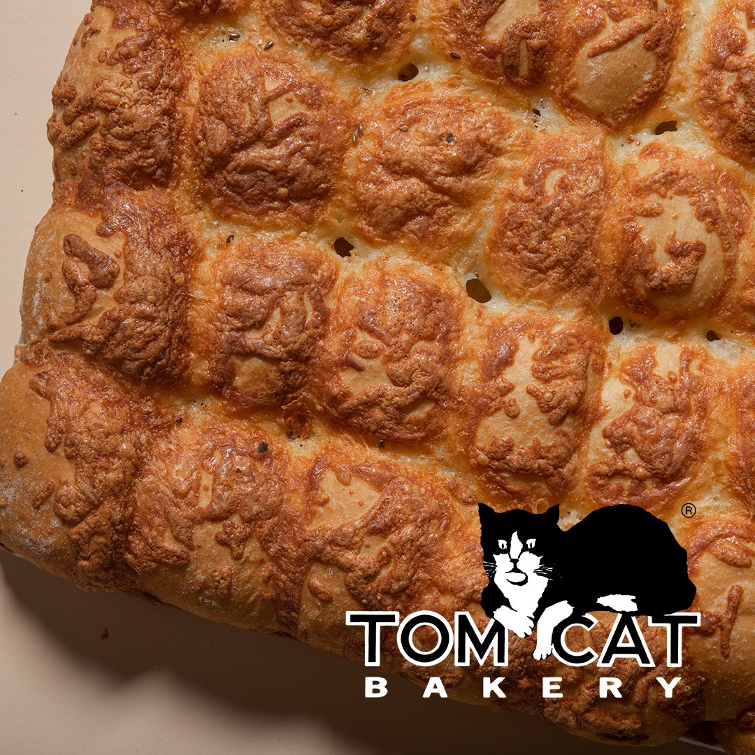 TomCatBakery's tweet photo. 🍞👨‍🍳🤤 Attention all chefs! Are you ready for a cheesy twist on the classic brioche roll? Tom Cat Bakery's cheddar pullapart rolls are the ultimate comfort food. https://t.co/QX5ZxDocre #nycbakery #artisanbread https://t.co/6Dp5LeJBsM