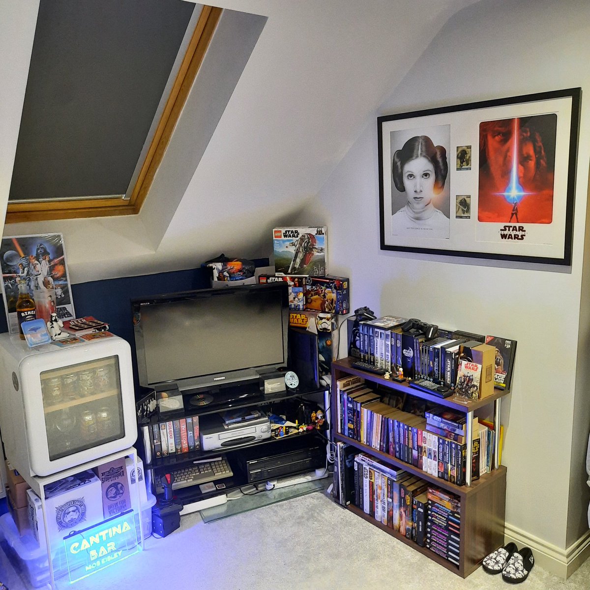 StarWarsSucker's tweet photo. Framed #StarWarsCelebration posters and passes back up on the wall after 2 years of wondering where to put it after the move 😂 Seems to go quite nicely in the media corner!
#SWCO #SWCO2017 https://t.co/XA1LNOXGul
