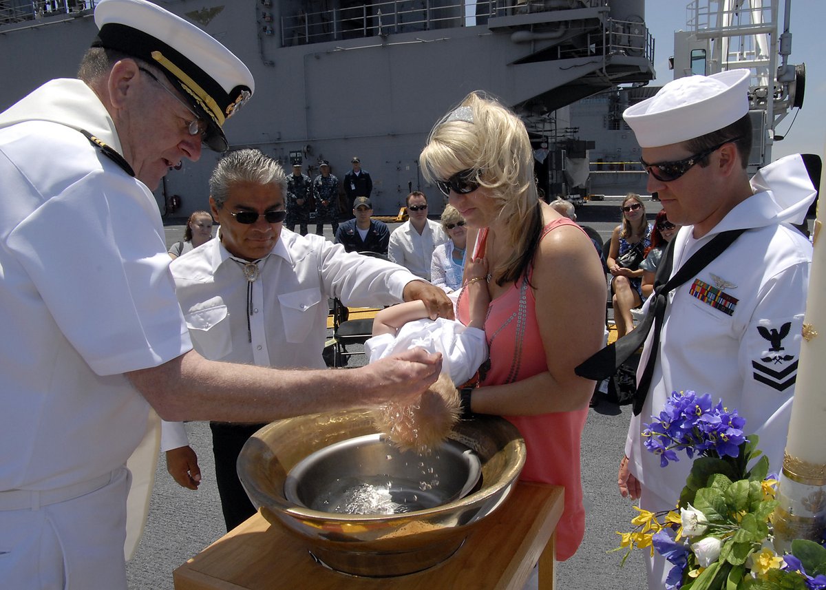 NavalInstitute's tweet photo. Today is Baby Day. Navy tradition allows for sailors to have their babies baptized in their ship's bell. The name of the baby is then engraved inside the bell as a permanent record. 
#BabyDay #NationalBabyDay https://t.co/1Ma5mqOWJt
