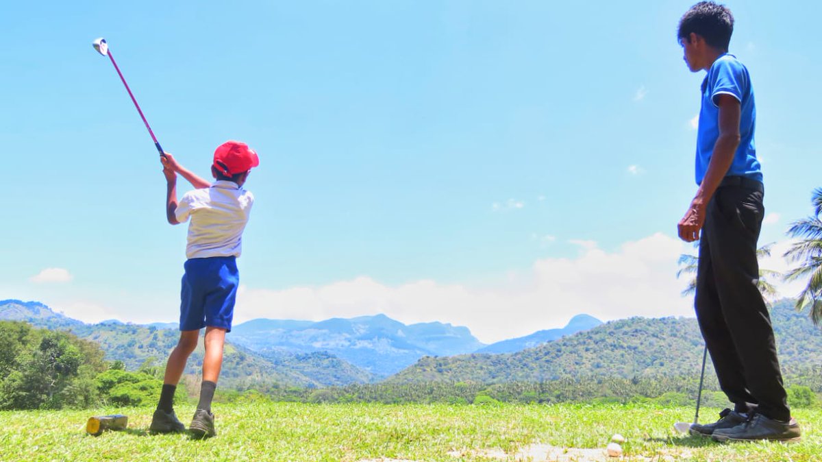 Troon's tweet photo. Victoria Golf Resort in Sri Lanka recently welcomed 25 children from a local school in Digana as part of their “First Club Initiative” for an intro to golf and to experience the social side of the golf club. A cool program that helps #GrowTheGame. #PlayerDevelopmentMonth https://t.co/MIoRcYccyB
