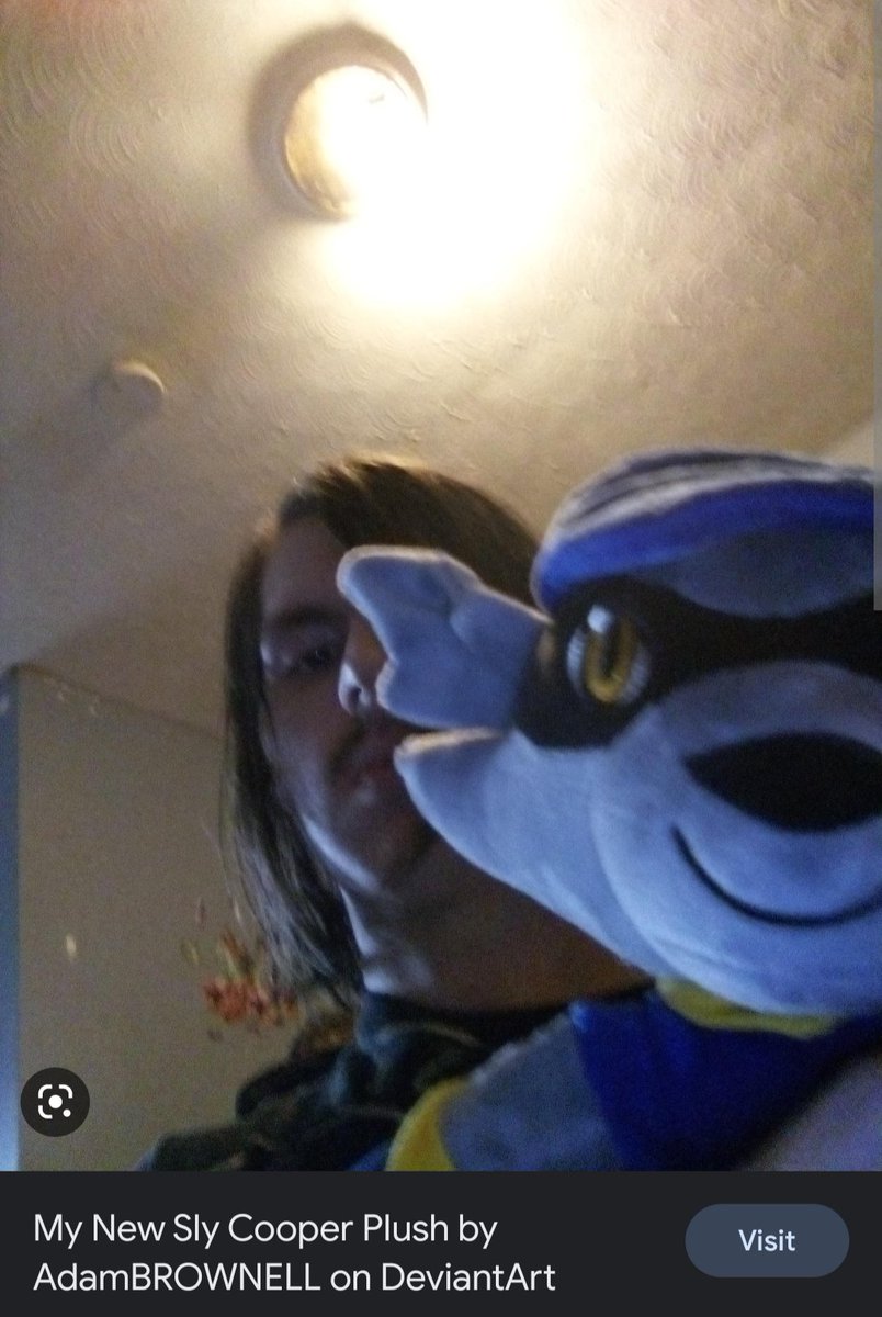 He is, infact, up to NO good with that sly Cooper plushie