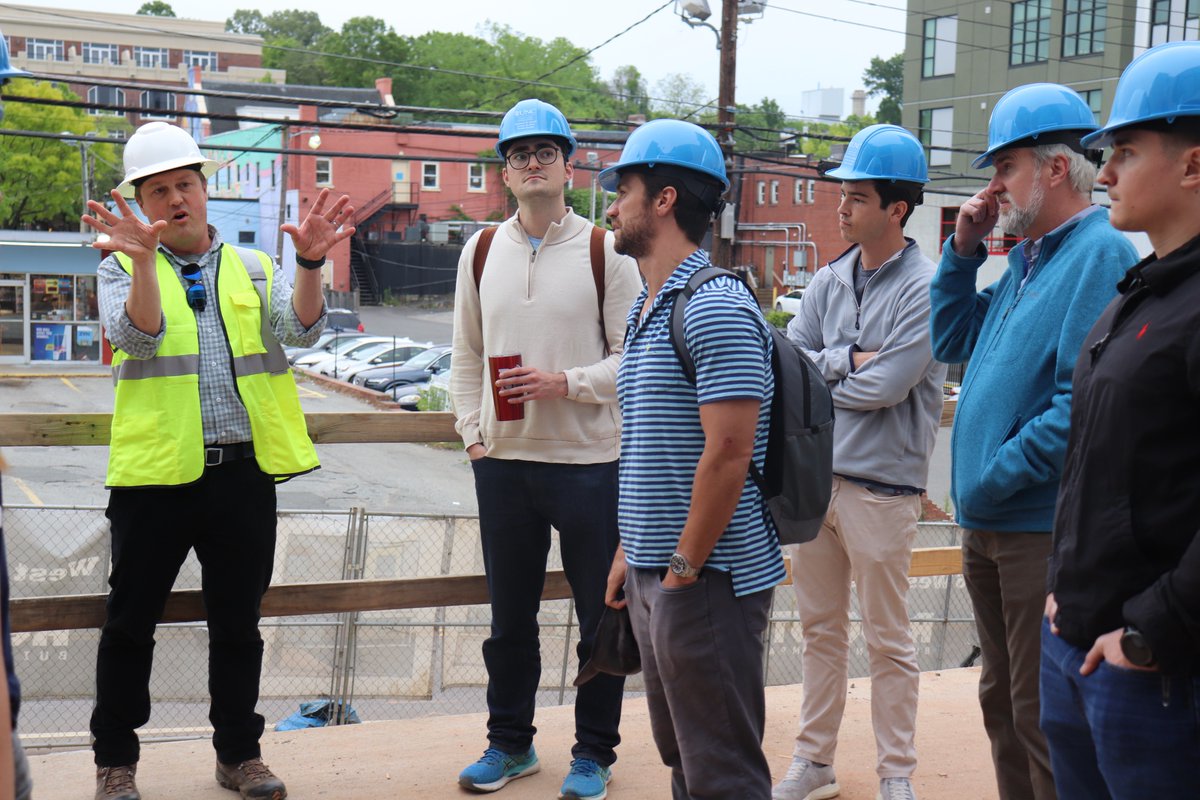UNCRealEstate's tweet photo. First-year MBA students toured the site of The Preiss Company's new off-campus residential project The Warehouse in Chapel Hill. The site tour is a part of Bob Skinner's Mod IV Construction Basics for Real Estate Development class. #UNCrealestate #RealWorldRealEstate #MBA https://t.co/alrjtXlVgi