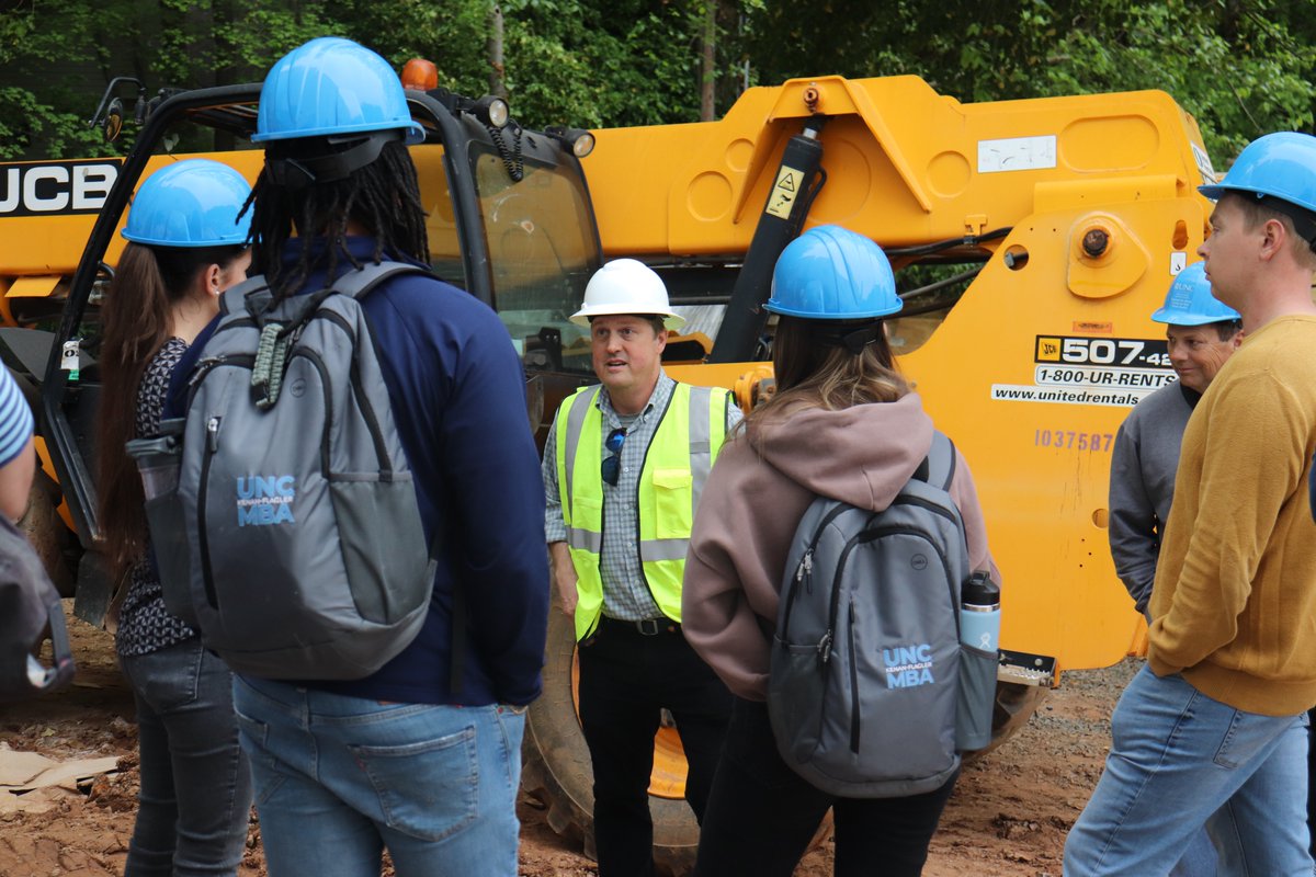 UNCRealEstate's tweet photo. First-year MBA students toured the site of The Preiss Company's new off-campus residential project The Warehouse in Chapel Hill. The site tour is a part of Bob Skinner's Mod IV Construction Basics for Real Estate Development class. #UNCrealestate #RealWorldRealEstate #MBA https://t.co/alrjtXlVgi