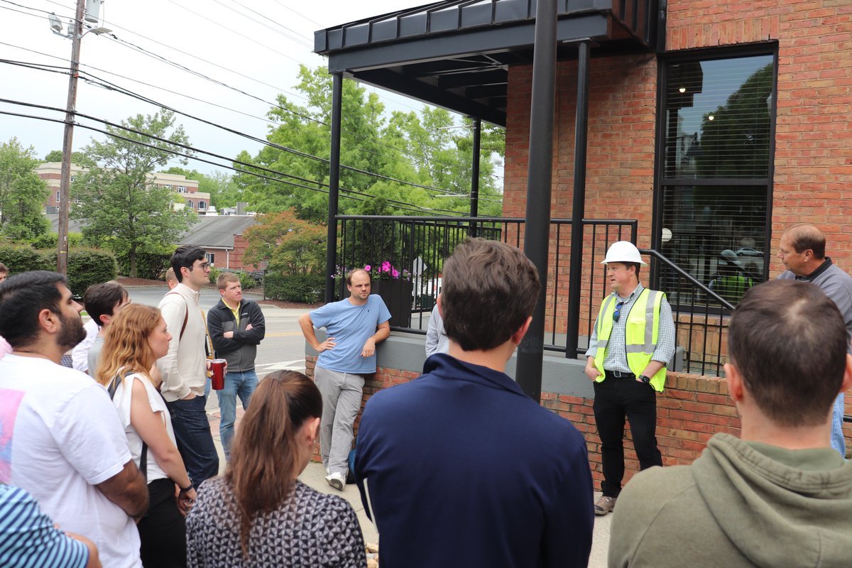 UNCRealEstate's tweet photo. First-year MBA students toured the site of The Preiss Company's new off-campus residential project The Warehouse in Chapel Hill. The site tour is a part of Bob Skinner's Mod IV Construction Basics for Real Estate Development class. #UNCrealestate #RealWorldRealEstate #MBA https://t.co/alrjtXlVgi