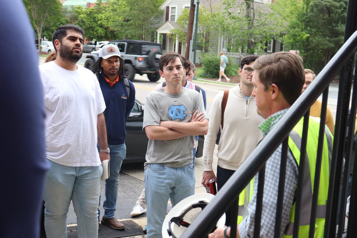 UNCRealEstate's tweet photo. First-year MBA students toured the site of The Preiss Company's new off-campus residential project The Warehouse in Chapel Hill. The site tour is a part of Bob Skinner's Mod IV Construction Basics for Real Estate Development class. #UNCrealestate #RealWorldRealEstate #MBA https://t.co/alrjtXlVgi