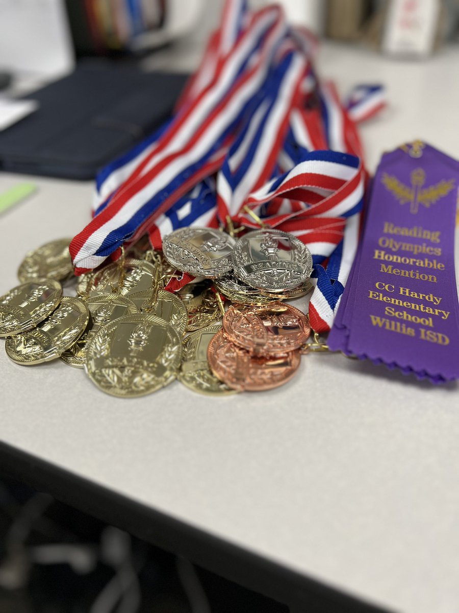 Getting these medals and ribbons ready to handout at end of year awards for CC Hardy Reading Olympics! Hard work pays off. @WISDHardy @WillisSchools @WISDiCoaches