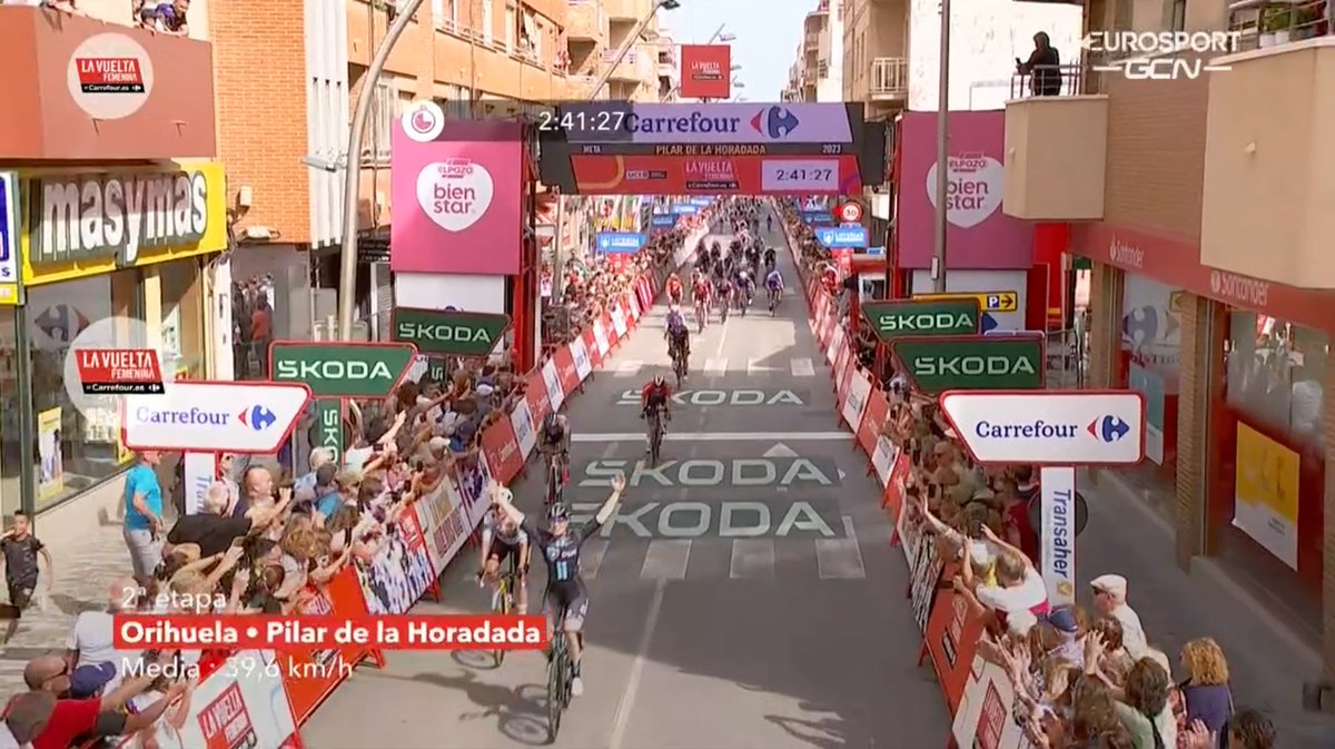 That was fast! 🌬️🥵 <a href="/charlotte_kool/">Charlotte Kool</a> shows her power and sprints to glory on the first road stage of #LaVueltaFeminina after being set up perfectly by her teammates! 😍

#KeepChallenging