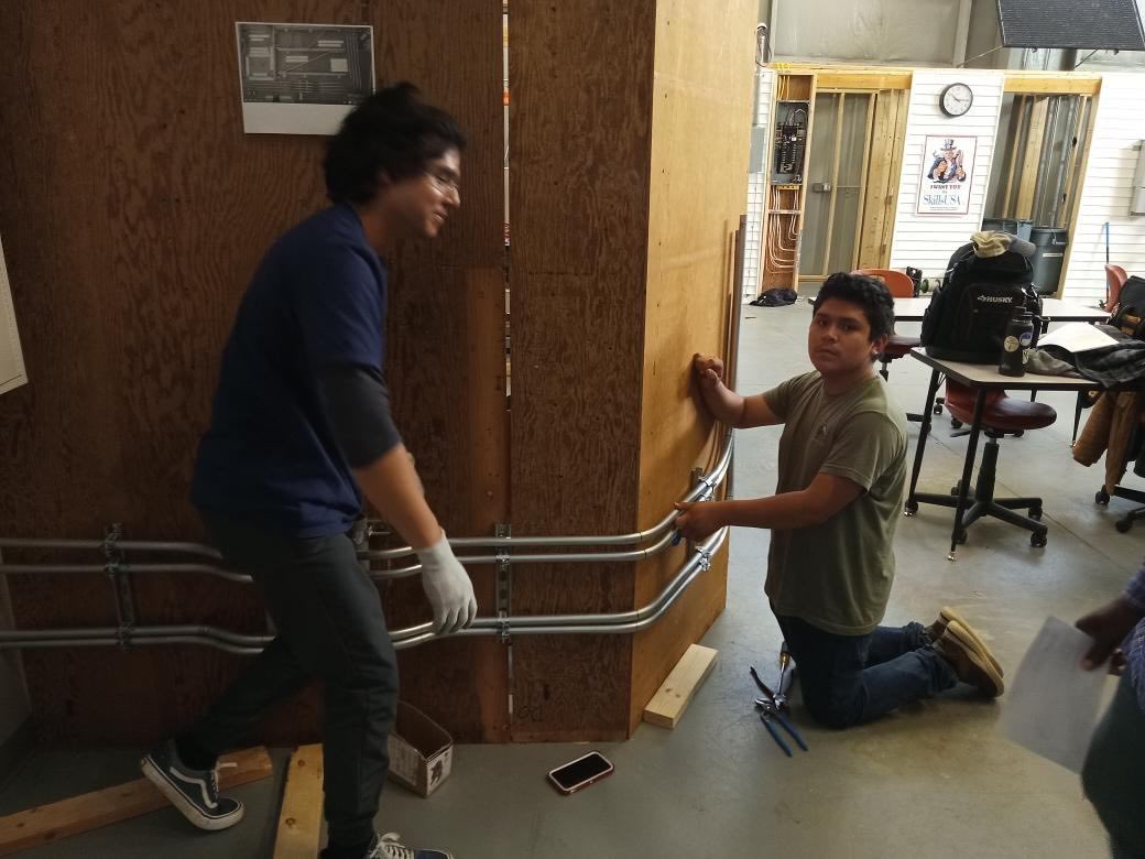 VernonMaloneCCA's tweet photo. The conduit demo wall created by Facility Maintenance Technology seniors will leave a lasting impression of learned electrical skills and detail. #vmccaelectrical @wcpssmagnets @WCPSS @waketechcc https://t.co/IE6PP3ASE0