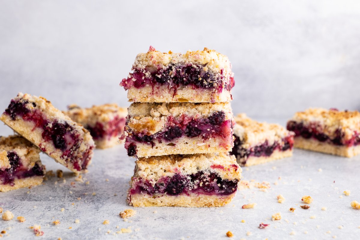 These berry crumb bars are perfect for spring and summer baking! Raspberries, blueberries, and blackberries sandwiched between buttery crumb layers— what’s not to love?! completelydelicious.com/raspberry-and-…