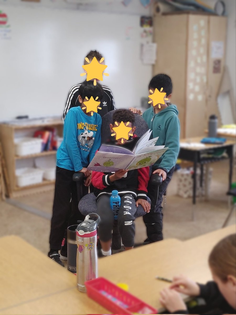 MsKThiel's tweet photo. I've said it before and I'll say it again: No one is EVER too old for story time! As part of our #BookADayChallenge, the VIP Student of the Day chose some of his best buds to help him lead the class read-a-loud @StAgnesCES #wcdsbAwaken #wcdsbAwesome #wcdsbNTIP https://t.co/jAOBib4vbn