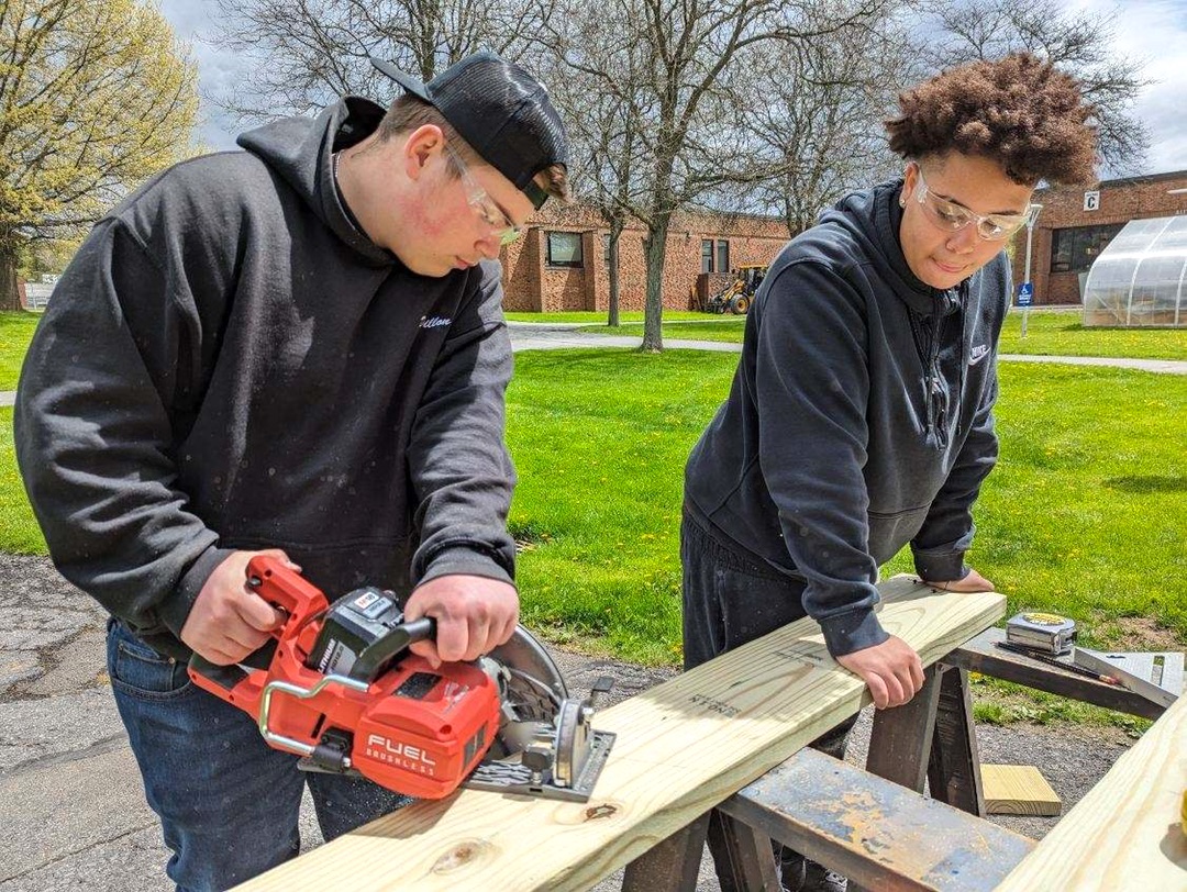 Laila and Dillon from CEP are building benches as part of a fundraiser for Happier At Home! This agency provides elders with care in private homes and apartments, independent &amp; assisted living communities, hospitals, skilled nursing facilities, and rehabilitation centers.