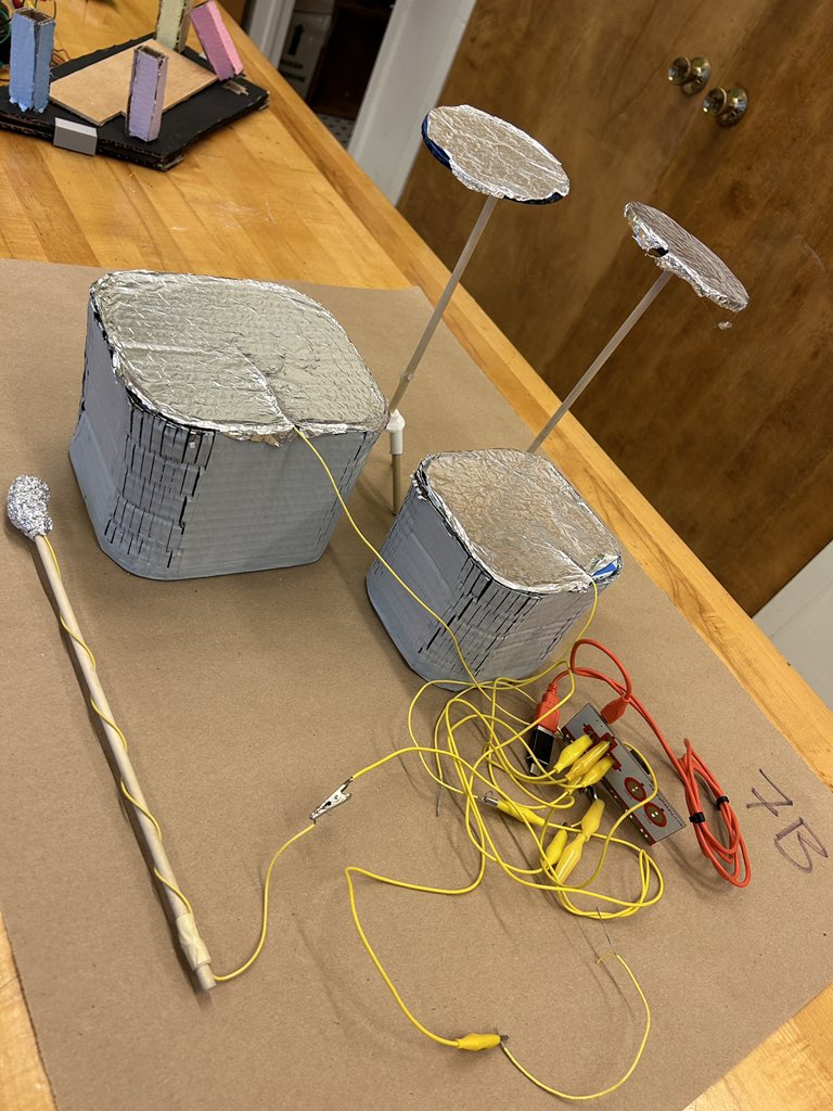 joshburker's tweet photo. “Percussive” instruments constructed by Class VII @MarymountNY students. @MakerCase and @tinkercad designed models, @EpilogLaser cut cardboard, conductive copper tape, wire, solder, @makeymakey and clone. #fabrication #programming #steam #makered https://t.co/oubToRMkRn
