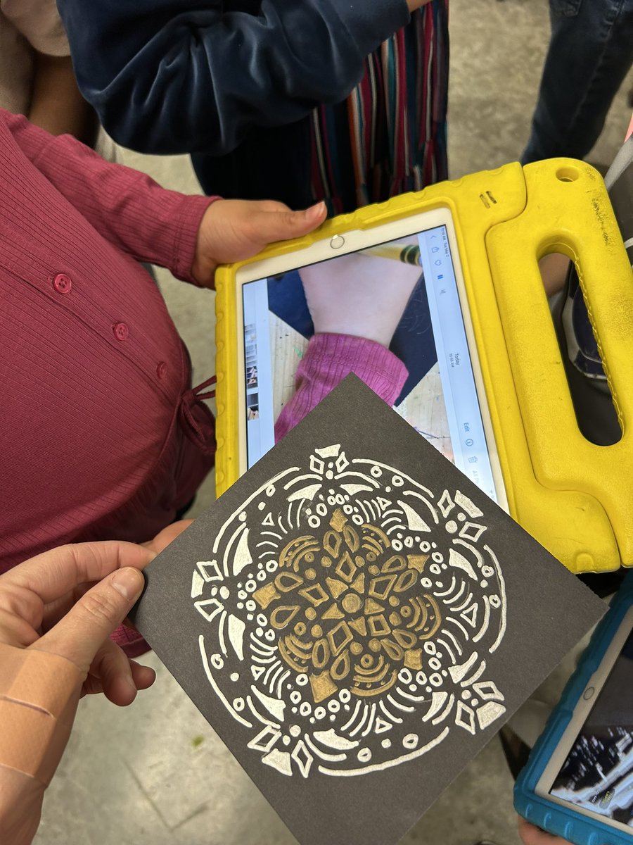 Fourth graders create radial designs using the beautiful contrast of metallic color on black. They document their #process using the time lapse feature of their camera.  #multimedia #art #arteducation #arted #drawing #contrast @GlacierHills @ISD196Magnets