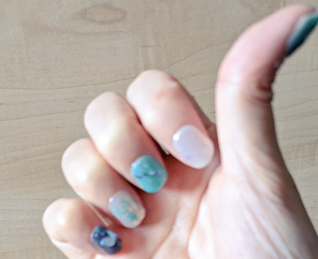solo nail polish blue nails close-up aqua nails toenails blurry  illustration images