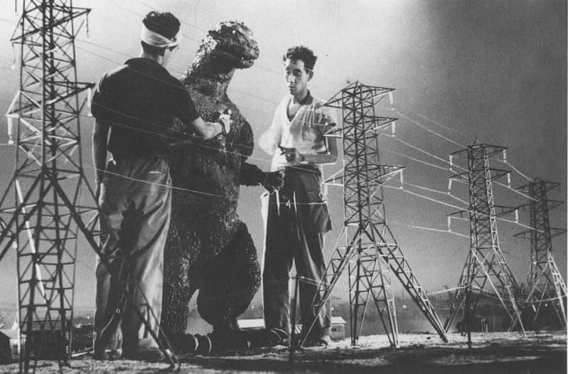 Behind the scenes photo from the making of the first Godzilla movie, 1954.