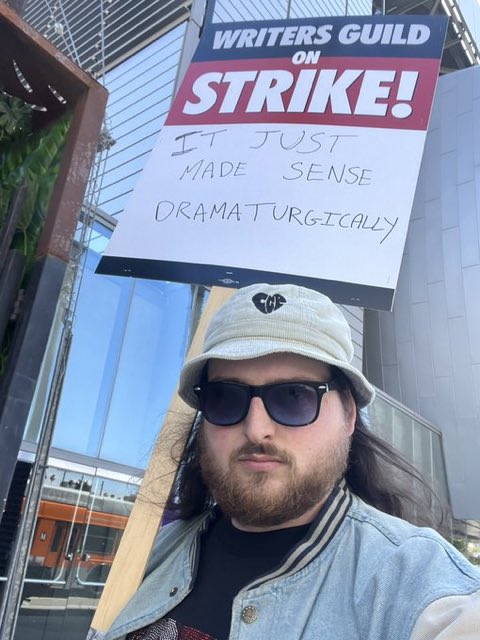 MediumSizeMeech's tweet photo. Writer’s Strike signs >>> guywiththesign https://t.co/0GRZxfHysk