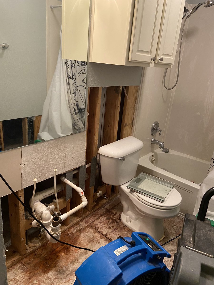 KellyAnne1008's tweet photo. I woke up to a flood on Monday morning and it was coming from the bathroom upstairs. This is what happens when your toilet moves because padding is placed under your new floors when they should be flush to the concrete in the bathroom area. After further investigation, https://t.co/vOK0SPITux