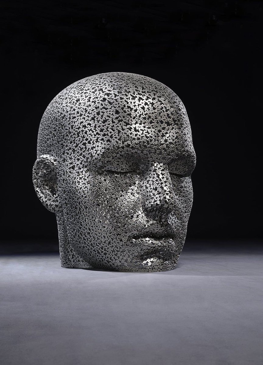 on Twitter "Massive Human Head Sculptures Made of
