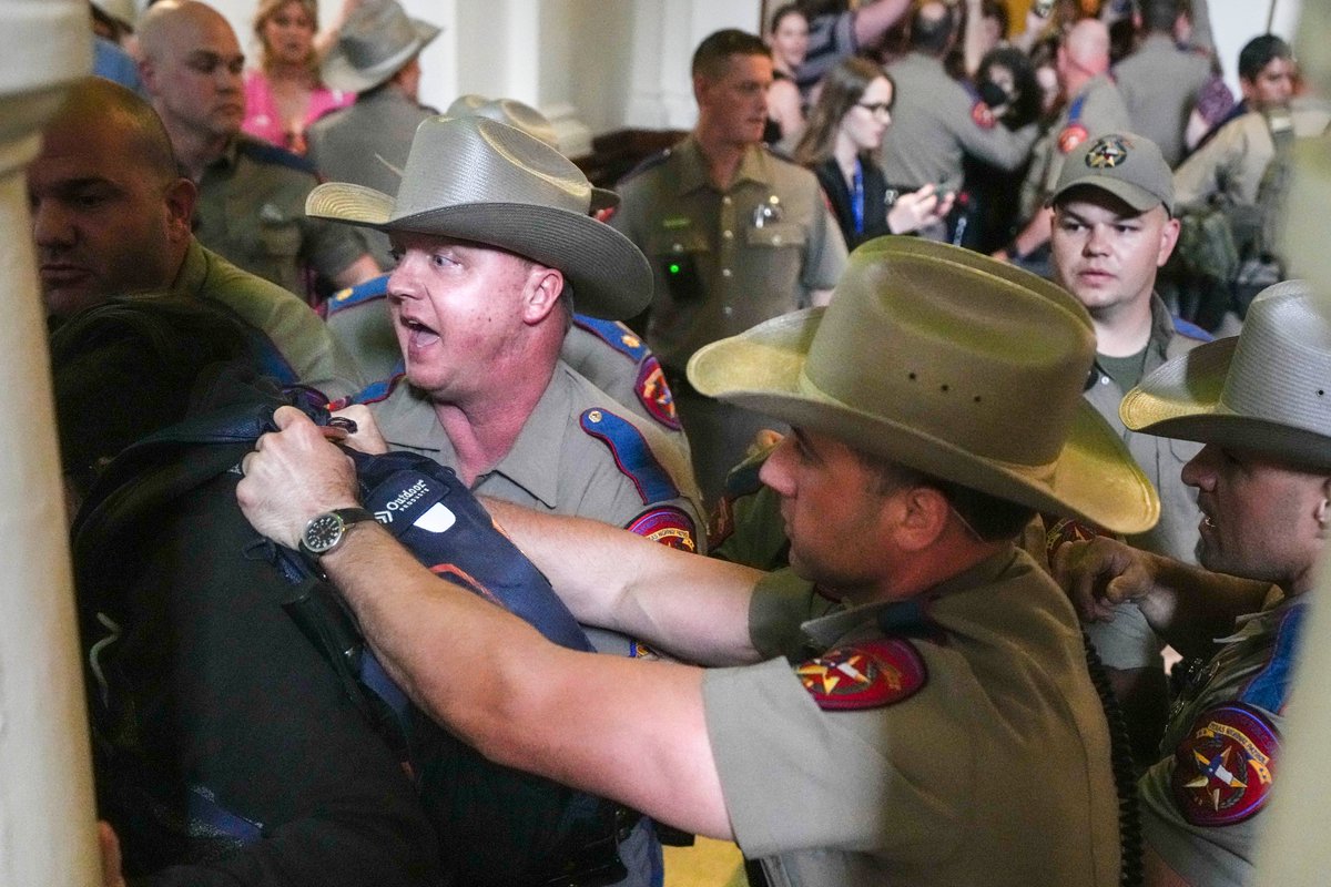 LGBTQ rights activist @AdriPerezTX was detained by DPS troopers as activists protested SB14 outside the Texas House of Representatives at the Capitol today. The bill would  ban gender-affirming medical care for transgender children.