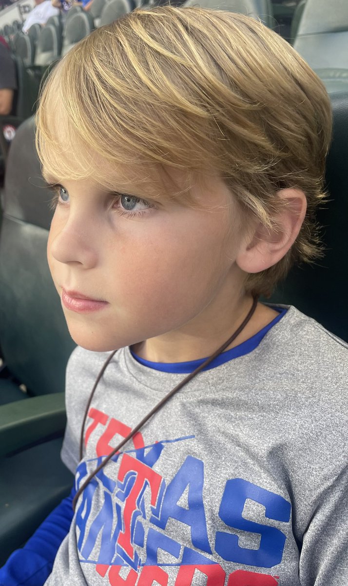 durrett's tweet image. Taking it all in at his first Ranger game! #globelifefaces