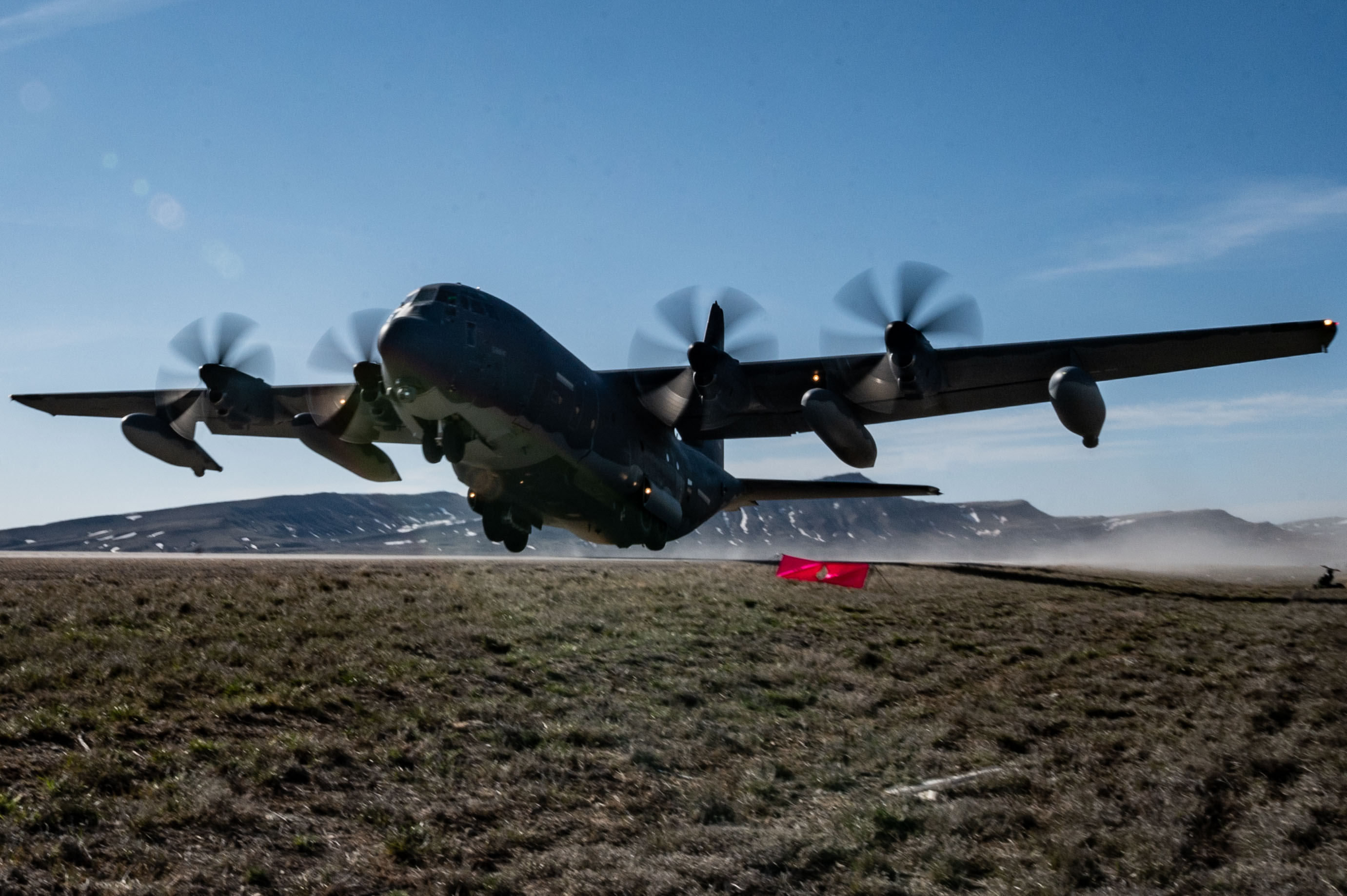 An MC-130J Commando II takes off of Highway 287 during Exercise Agile Chariot, April 30, 2023, honing capabilities linked to Agile Combat Employment. Instead of relying on large, fixed bases and infrastructure, ACE uses smaller, more dispersed locations and teams to rapidly move and support aircraft, pilots, and other personnel to wherever they are needed. There are millions of miles of public roads in the United States, including federal, state, and local roads – with Agile Combat Employment, including Forward Arming and Refueling Point (FARP) and Integrated Combat Turnarounds (ICT), it can become millions of miles of public runways, when necessary. (U.S. Air Force photo by Tech. Sgt. Carly Kavish)