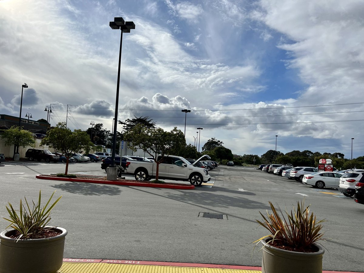 LyftGyft's tweet photo. Left the Frunk open while I refilled my water bottles.  First guy stops and stares. Then a lady strolls up.  Now I’m heading back to my truck. I say “different right” they say “oh yes”. I tell them It’s fully electric. They are in disbelief. I share the specs and they say SOLD! https://t.co/xPaPNcjAP6