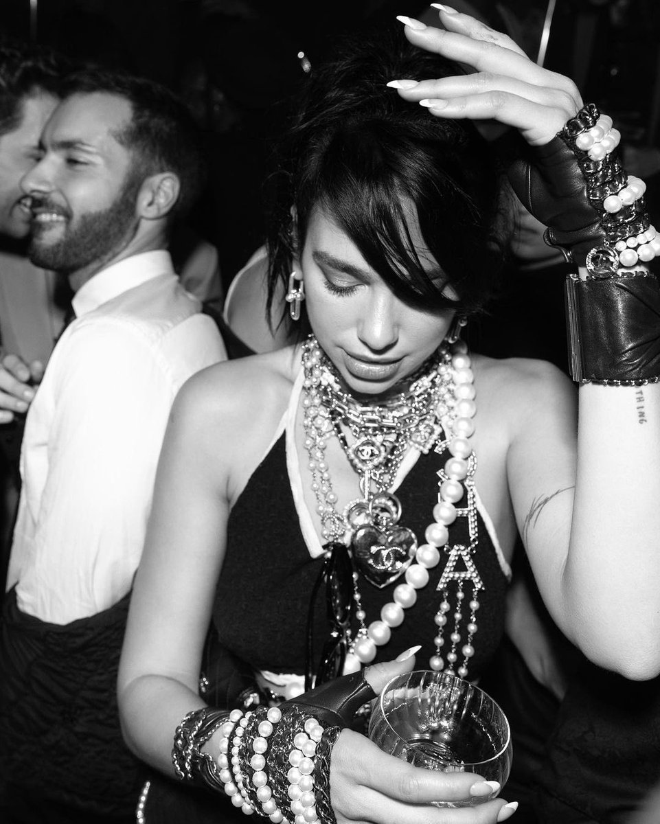 DUALIPA's tweet photo. Threw a little after-Met Gala mash uppppp!! Thank you to everyone who made last night possible🖤!!!! https://t.co/xseK6XfpoT