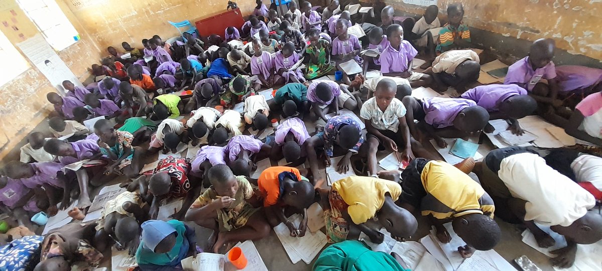 DemberyoCSG's tweet photo. Mugisha, a @TEACH4UG Fellow is fundraising to purchase 42 desks for his learners who sit on the floor dirtying their uniforms and unable to improve their handwriting. You can contribute to help make this possible! 
#desksforBUGWE 

@newvisionwire @actnforchildren @save_children https://t.co/TFfhJ2MtjS