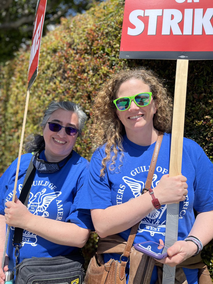 Thanks in part to gains won in the 2007-8 strike, we had @WGAWest coverage for our scrappy, low-budget, and ultimately Emmy-winning, web series, @TheLBDofficial. Ten years later, fellow writer @NobleRorick and I reunite on the picket lines! #WGAstrong