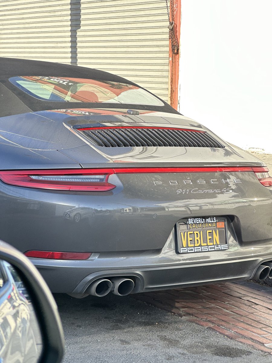 If there was a better vanity license plate for a ~$140k car, I cannot think of one. Had to go round the block again to snag a pic.