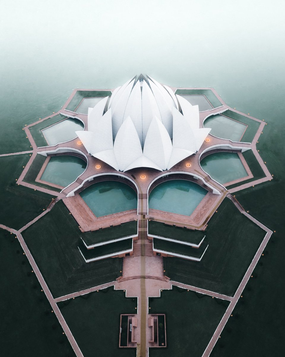 This temple gives the impression of a half open lotus flower afloat, surrounded by its leaves.
The shining pure white marble, the majestic dome, the petals clearly standing out creates a sense of grandeur and awe.

<a href="/DJIGlobal/">DJI</a> 
<a href="/tourism_delhi/">Delhi Tourism</a> 
<a href="/incredibleindia/">Incredible!ndia</a> 
#lotustemple #Delhi