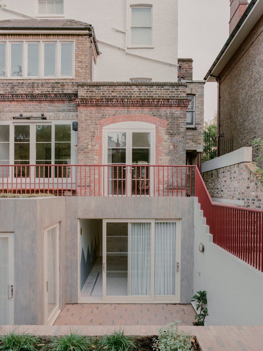 dezeen's tweet photo. Neiheiser Argyros refreshed this Victorian terrace house with a timber-clad extension: https://t.co/6TkCDYzGLp https://t.co/5486rRXrRq