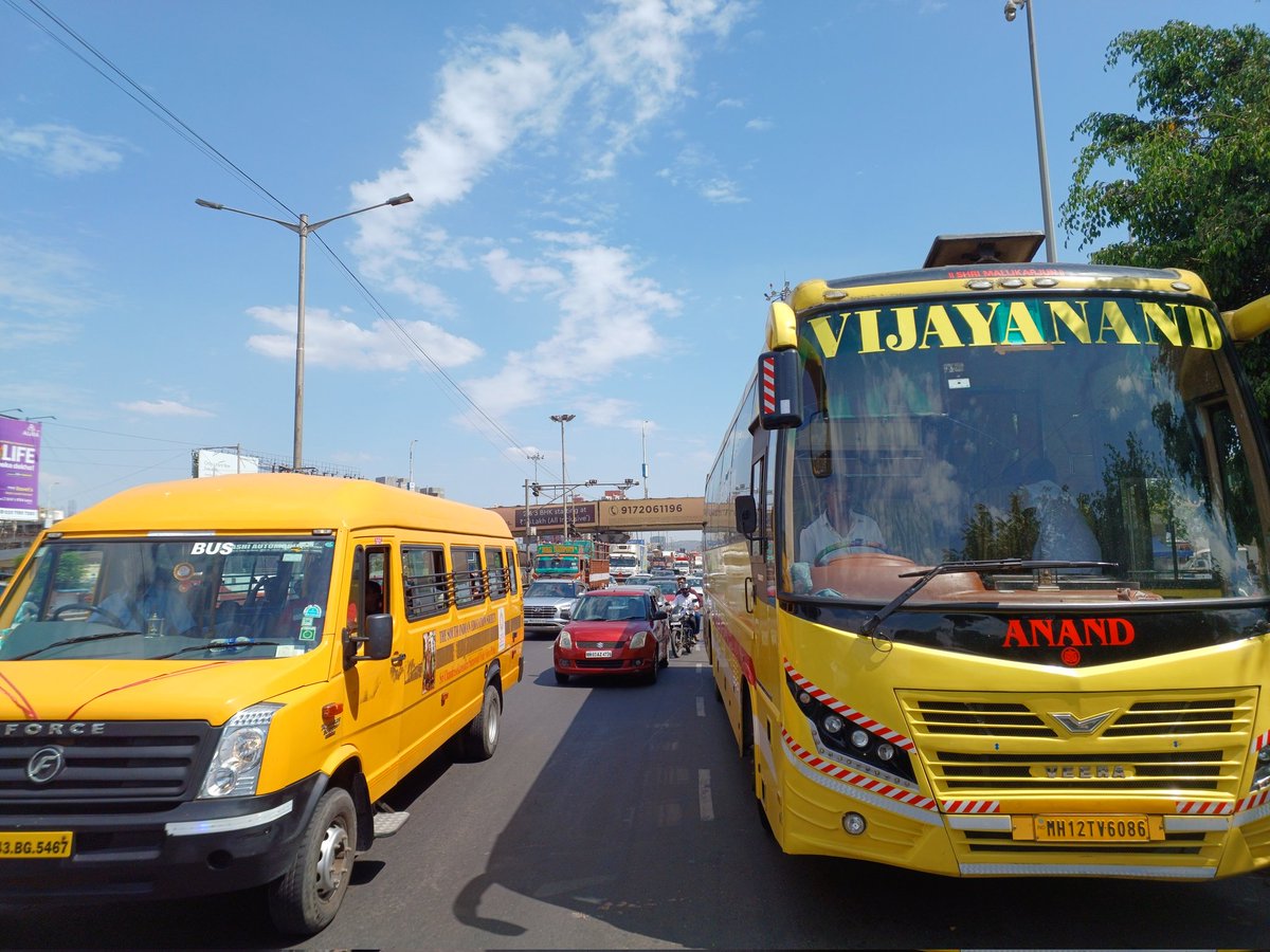 HastakSMH's tweet photo. @PCcityPolice Please take action against this bus parkes on a no parking zone  near Wakad bridge on Blore hway which blocked traffic for 2 kms on 01st May around 3 PM. 
Bus No MH12TY6086.

Images below show the traffic piling up behind https://t.co/ruQueB7ooH