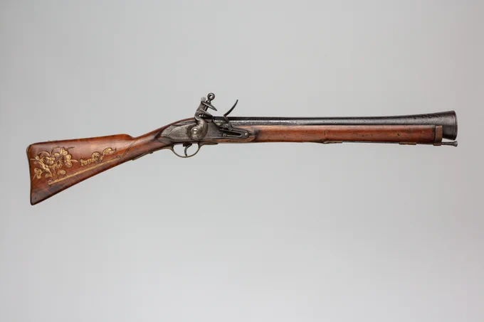 ブランダーバス(blunderbuss) 日本語でラッパ銃とも呼ばれる、近世の火器。大口径短銃身の小銃であり、砲口が広がっている。オランダ語のdonderbus(雷の筒)が語源であり、blunder(混乱させる)と合成されブランダーバスと呼ばれるようになった。発射時の爆音が雷を連想させたためだという。