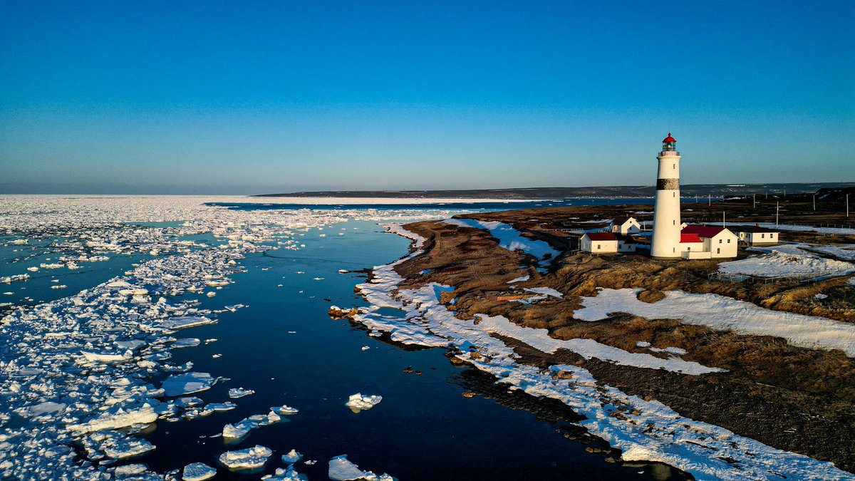 Sunrise at the point a few days back - I was huntin’ icebergs and happened on a lighthouse!