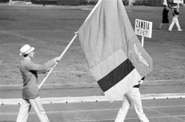 At the opening ceremony of the 1964 Olympics in Japan, athletes representing Zambia were observed carrying the Northern Rhodesia Flag (on the left). However, at the closing ceremony on October 24th, 1964, the same athletes were seen proudly bearing the Zambian flag (on the…