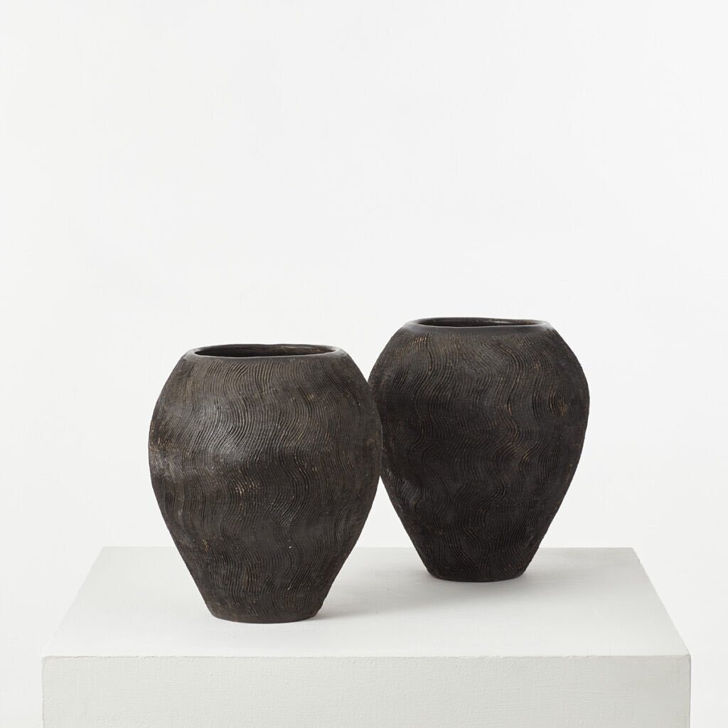 Stronger together. (🇪🇺)

Set of two cold painted terracotta ovoid vases
Unknown, 20th century
(Available)

A pair of beautifully formed ovoid vases in blackened terracotta. Their surfaces are grazed in texture in a gentle wave pattern. They are not glaze… instagr.am/p/CryMLetPZHk/