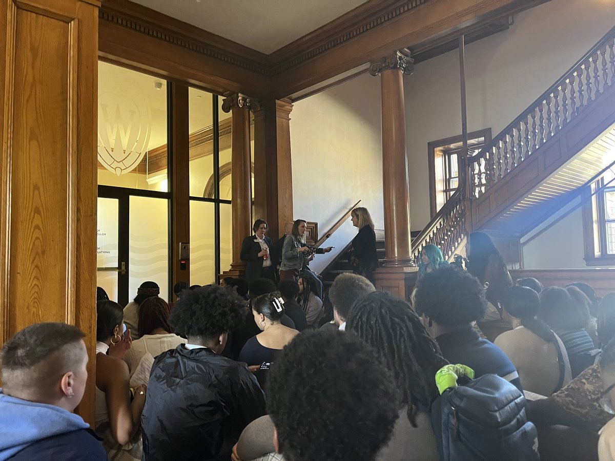 TylerKatzen's tweet photo. Happening now: Hundreds @UWMadison students are gathered in Bascom Hall, outside @uwchancellor’s office, for a silent protest in response to a racist video circulating social media. https://t.co/2ANxtiqhCb