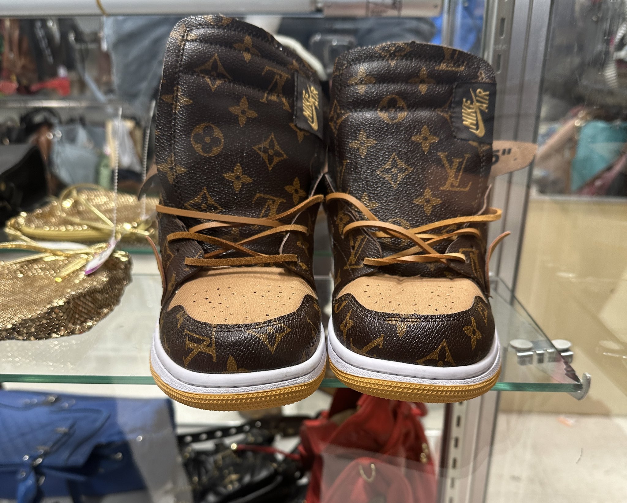 TBlake on X: Anyone want to guess the price of these replica Louis Vuitton  Nike/Jordan jawns at the local thrift?  / X